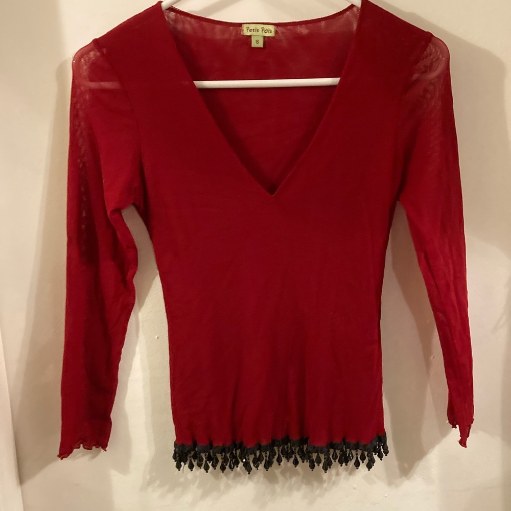 True item of the 90’s maybe even 80’s. Never worn beautiful red to with beads.